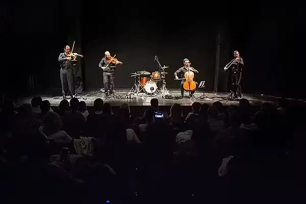 Ondanueve String Quartet performing live in a theatre